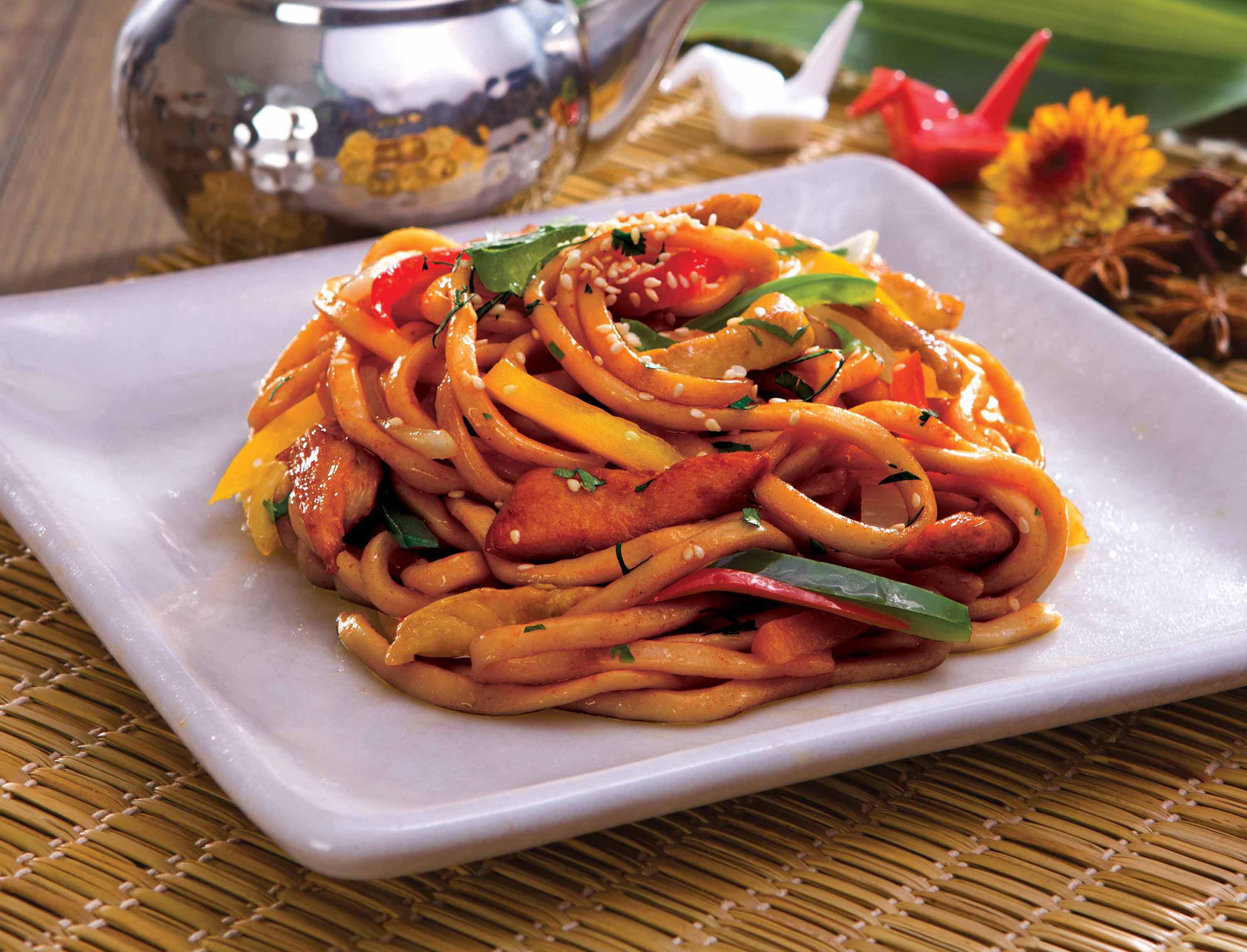 Plate of foodservice Amoy Japanese Udon Noodles in a restaurant setting